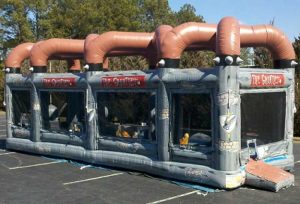 Picture of the Gauntlet inflatable. The inflatable is mostly grey with brown top.